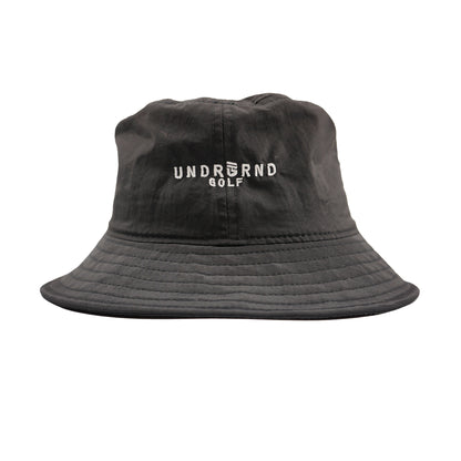 Black nylon bucket hat with UNDRGRND GOLF logo on the back. 